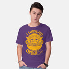 Model wearing purple Survivor – Sci-Fi Graphic T-Shirt