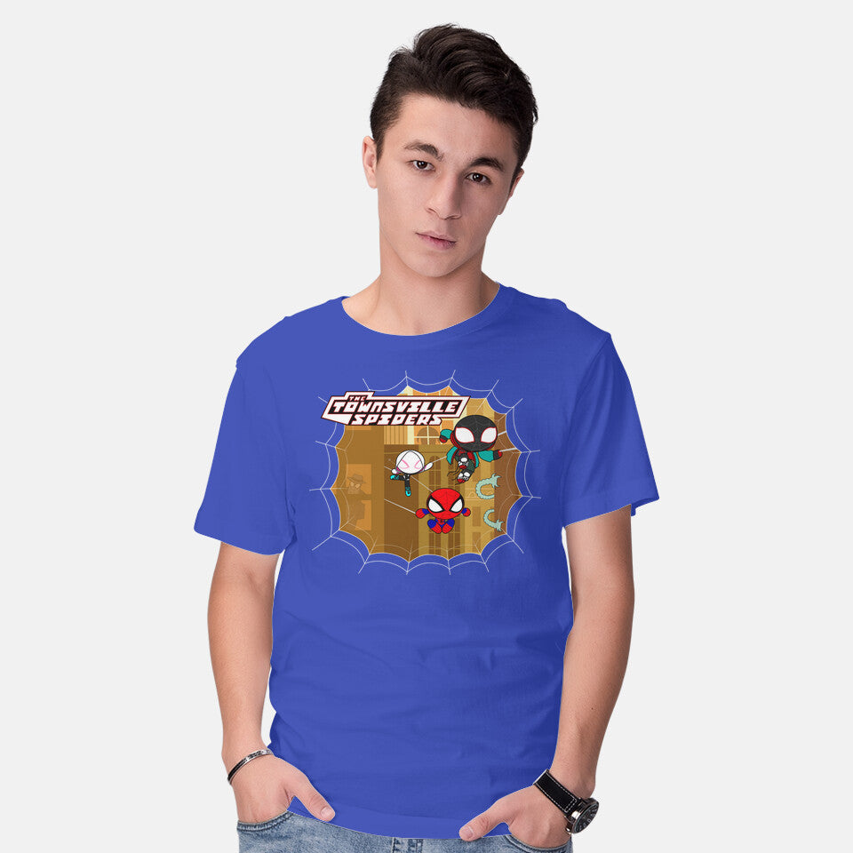 Model wearing royal blue The Townsville Spiders – Movie Graphic T-Shirt