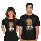 Model wearing black Cute We Are Groot – Sci-Fi Graphic T-Shirt