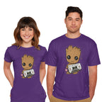Model wearing purple Cute We Are Groot – Sci-Fi Graphic T-Shirt
