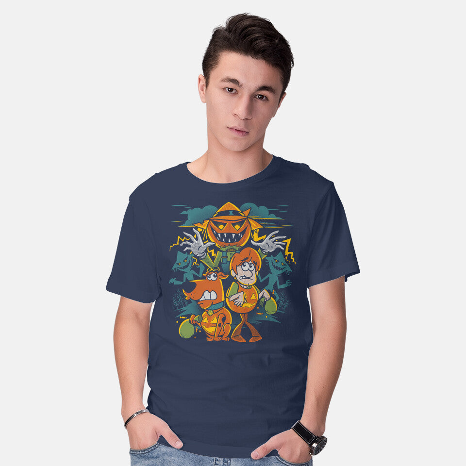 Model wearing navy Mystery Tricks Or Treats – Halloween Graphic T-Shirt