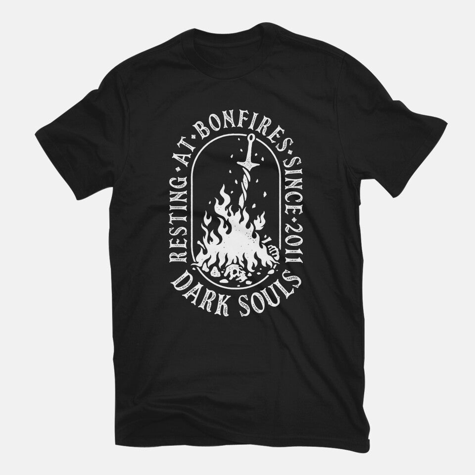 Resting At Bonfires – Gaming Graphic T-Shirt in black, flat-lay product view