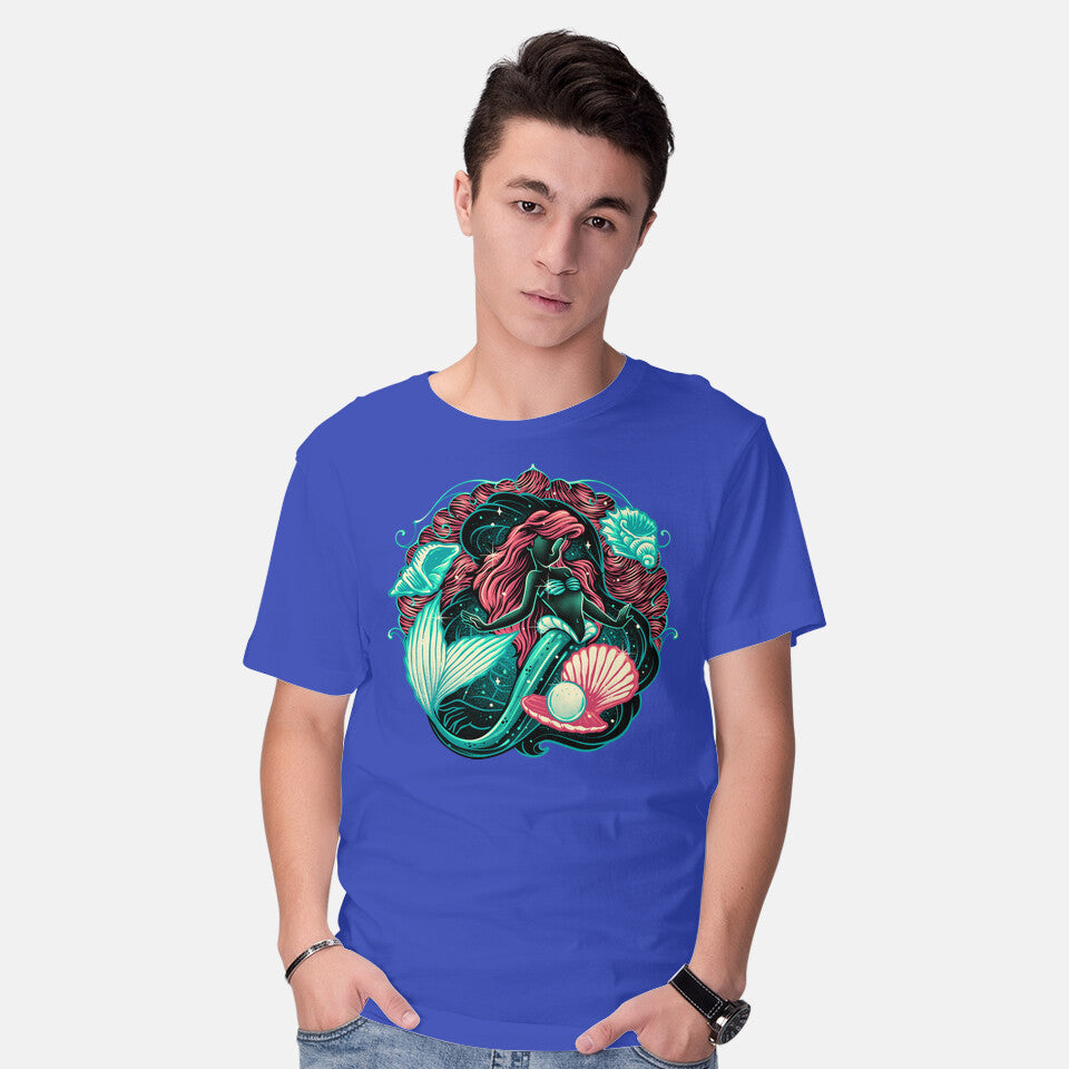 Model wearing royal blue Under The Seas Of Stars – Fantasy Graphic T-Shirt