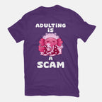 Adulting Is A Scam – Coffee Graphic T-Shirt in purple, flat-lay product view