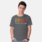 Model wearing charcoal Raccoon City 1996 Graphic T-Shirt