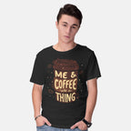 Model wearing black Me And Coffee Are A Thing – Coffee Graphic T-Shirt