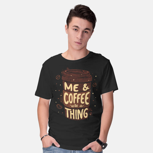 Model wearing black Me And Coffee Are A Thing – Coffee Graphic T-Shirt
