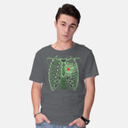 Model wearing charcoal Grinch's Heart – Movie Graphic T-Shirt