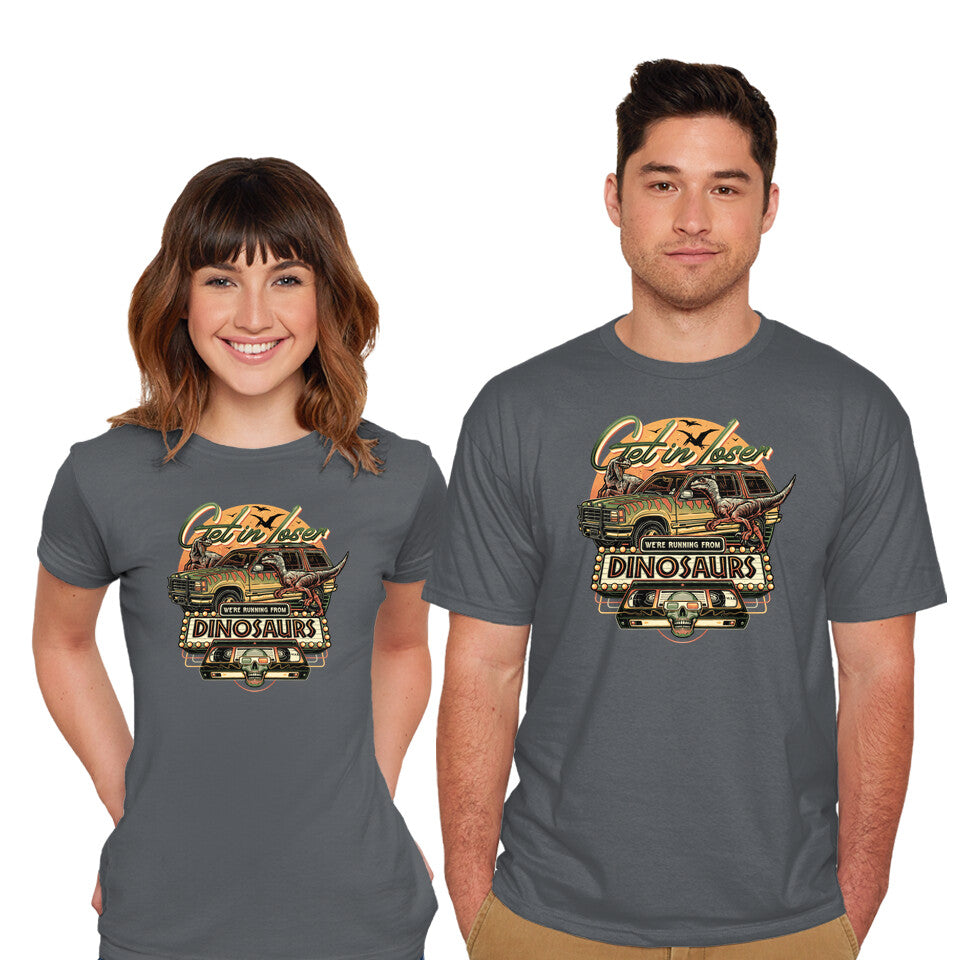 Model wearing charcoal Running From Dinosaurs – Movie Graphic T-Shirt