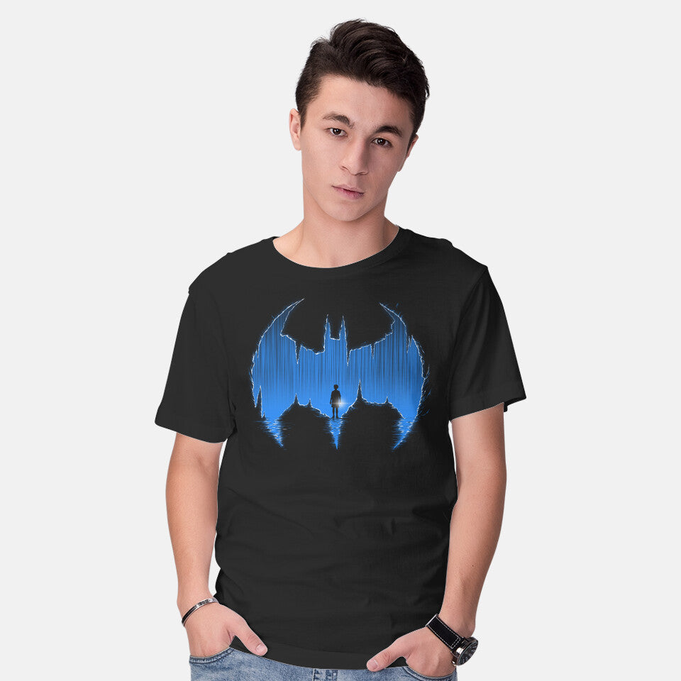 Model wearing black Bat Cave – Movie Graphic T-Shirt